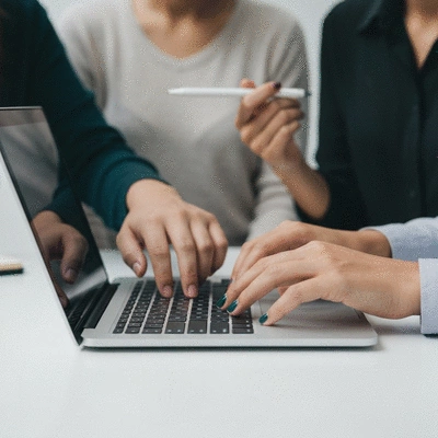 Close-up of diverse hands collaborating on a laptop, symbolizing continuous learning and development in a team, no text, no words, no typography, clean image